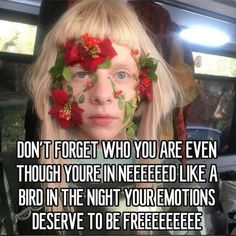 a woman with flowers on her face and the words, don't forget who you are