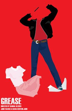 a man in red shirt and jeans standing next to a pile of paper on a red background