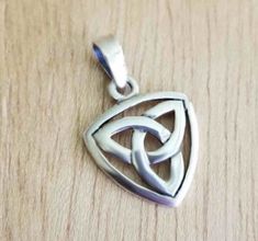 This simple pendant works perfectly with a long chain to create a simple necklace for the fashionable Irish man Celtic Trinity Knot, Simple Pendant, Trinity Knot, Irish Heritage, Irish Men, Simple Necklace, Long Chain, Sterling Silver Pendants, Jewelry Stores