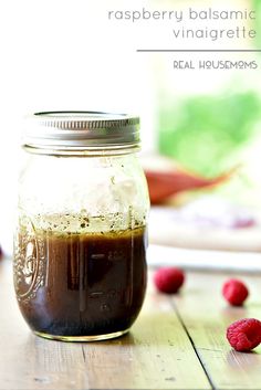 raspberry balsamic vinaigrette in a mason jar on a wooden table