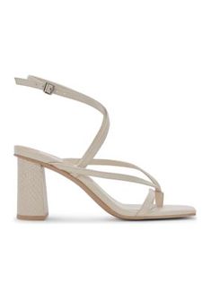 Crafted out of sophisticated leather, the Paroo Sandals from Dolce Vita boast an iconic strappy silhouette and trend-forward block heel. | Dolce Vita Women's Paroo Sandals, Ivory, 8.5M Chic Adjustable Block Heels With Wrapped Heel, Chic Cream Leather Block Heels, Chic Cream Block Heels With Sculpted Heel, Chic Cream Block Heels With Square Toe, Chic Heels With Padded Heel And Adjustable Fit, Chic Adjustable Heels With Padded Heel, Chic Cream Block Heels Medium Width, Cream Sandals With Square Toe For Evening, Evening Sandals With Square Toe In Cream