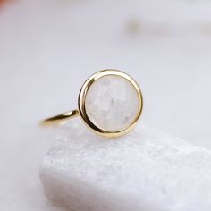 14K gold rainbow moonstone ring. A gorgeous moonstone ring, ideal for every woman who loves elegant style. An excellent choice for anniversary gift or birthday gift for her. The gemstone is natural and conflict-free mined. 100% handcrafted with love! PRODUCT DETAILS ● Material: 14K solid gold, white gold, rose gold ● Gemstone: Moonstone, briolette cut ● Stone Diameter: 8mm (0.3in) or 10mm (0.4in) RING SIZING For General Reference: ● we use standard US Ring Sizing ● an average women's ring finger Everyday 14k Gold Moonstone Birthstone Ring, White Moonstone Ring With Si Clarity, Delicate 14k Gold Moonstone Ring, Yellow Gold Moonstone Ring With Halo, Yellow Gold Open Ring With Moonstone, Everyday Opal Ring With Round Shape, Elegant Round Moonstone Ring For Everyday, Moonstone Rings With Si Clarity For Anniversary, Moonstone Ring With Si Clarity For Anniversary