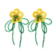 two yellow and green beaded flowers with beads on them, one is attached to the other