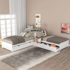 a white bed with two drawers underneath it