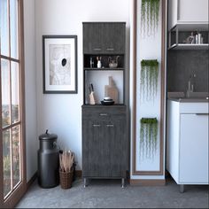 a kitchen with an open cabinet next to a window