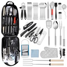 an assortment of kitchen utensils and tools in a black case on a white background