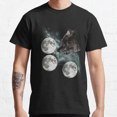 Standard fit with double-needle hems for durability. Solid colors are 100% preshrunk cotton, heather colors are cotton blend. Range of colors available, with the option to print on front or back. Size range S-3XL, suitable for men and women. Three Moon Wolf shirt! A new rendition of the popular "Three Wolf Moon" shirt by Antonia Neshev! Short Sleeve Moon Print T-shirt For Streetwear, Black Cotton T-shirt With Wolf Design, Black Cotton T-shirt With Moon Print, Black Cotton Top With Wolf Design, Three Wolf Moon, Moon Wolf, Wolf Shirt, Moon Shirt, Wolf Design