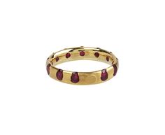 Bold and regal with its combination of 18K gold and rich rubies, this Polly Wales ring makes a stunning, modern alternative to the traditional wedding or anniversary band. The oval rubies are set directly into the 18K gold rather than cast resulting in a perfectly imperfect design. 18K yellow gold band width : 4mmrubies : vary : 2.5mm diameter to 3mm diameter eachavailable size : 6.5-please contact us for more sizing options Alice Cicolini, Digby And Iona, Zoe Chicco, Cathy Waterman, Royal College Of Art, Ruby Diamond, Anniversary Bands, Perfectly Imperfect, Gold Band