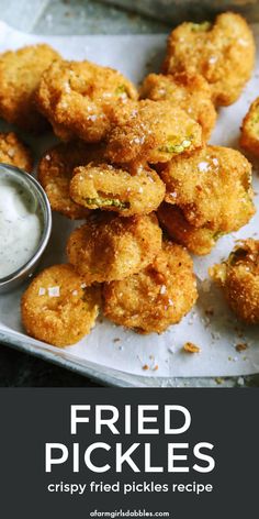 fried pickles on a plate with dip in the middle and text overlay that reads fried pickles crispy fried pickles recipe