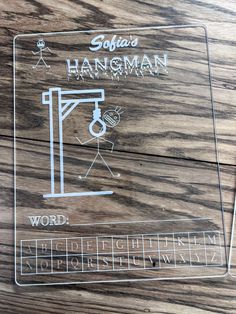 a glass plaque with an image of a stick figure on it