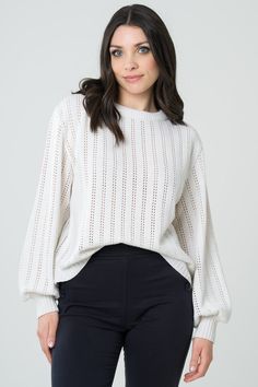 – Openwork sweater with round neck, loose fit and puffed sleeves– The model is 172 cm tall and wears a size M.– This sweater has a loose fit, take a size smaller for a more fitted fitColor: Off-WhiteComposition: 100% merino wool certified OEKO-TEX® 100 and mulesing-free.Manufacturing: knitted in Chamberet (FR) and made in Roanne (FR).This sweater is made from a natural material that is both comfortable and breathable for the skin. It is carefully made in France by artisans with unique know-how, Openwork Sweater, Ballerina Shoes Flats, Sports Activewear, Puffed Sleeves, Natural Material, Cardigan Jacket, White Sweaters, Knitted Sweater, Shop Blouses