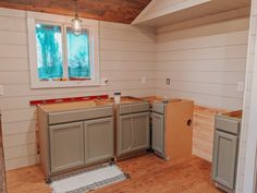 the kitchen cabinets are being installed in the room that's ready for remodeling