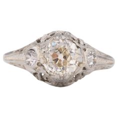 Ring Size: 4.75 Metal Type: 18 karat White Gold [Hallmarked, and Tested] Weight: 2.5 grams Center Diamond Details: GIA REPORT #: 2387601883 Weight: .99 carat Cut: Antique Cushion Color: M Clarity: VS1 Measurements: 6.01mm X 5.46mm x 4.03mm Side Stone Details: Weight: .20 carat total weight Cut: Antique European Cut Color: G Clarity: VS Finger to Top of Stone Measurement: 6mm Condition: Excellent Antique Cushion, Yellow Gold Engagement, Yellow Gold Engagement Rings, Art Deco Engagement Ring, Art Deco Diamond, Jewelry Rings Engagement, Cut And Color, Ring Verlobung, Types Of Metal