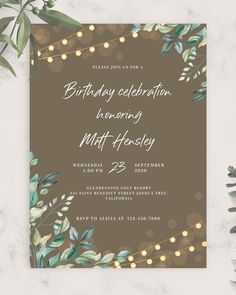 an elegant birthday party with greenery and lights on the front, is shown in brown