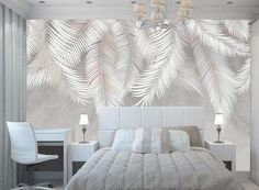 a bedroom with a bed, desk and lamp in it's center area that has palm leaves on the wall