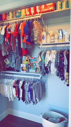 the closet is full of baby clothes and other items