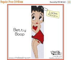 a cross stitch pattern for a woman in a red dress with a sign that says betty boop