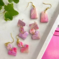 These sets of preppy pink clay earrings make a great gift for someone special, and an ideal staple this summer. Their surface contains a layer of UV resin to enhance the shine and longevity of the earrings. //SHIPPING// - Earrings will be shipped in a white box; includes an optional personalized message, earring care, and thank you cards. A great gift idea! - Free shipping for orders >$35 //MATERIALS// - Hand-crafted using lightweight polymer clay - Nickle Free - Hypoallergenic earrings posts, great for those with sensitive ears - UV Resin layer to add shine and protect the clay surface //CARE INSTRUCTIONS// - Polymer clay is durable but delicate and must be handled with care. May break if dropped or handled improperly. - Store in a clean, dry place & keep away from moisture - Remove befor Barbie Inspired Polymer Clay Earrings, Pink Polymer Earrings, Whimsical Pink Resin Earrings, Artsy Pink Polymer Clay Earrings, Pink Flower-shaped Polymer Clay Earrings, Pink Clay, Personalized Gift Wrap, Girly Gifts, Summer Earring