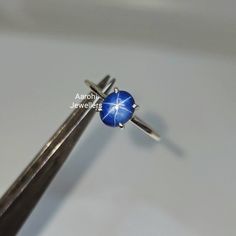 Title :Dainty Lab Star Sapphire Ring, Birthstone Ring ,Blue Star Ring Ring, 925 Silver, Star Sapphire Ring, Engagement Ring, Wedding Ring, Gift. Band : Aarohi Jewellers Material : 925 Sterling Silver Blue Star Sapphire Stone Wight :2.20Ct Sapphire Stone Size : 6.20x5.90 mm Style: Minimalist All of our jewelry is handmade with great care by our team. We carefully inspect all the jewelry after production and before shipping, and make sure you are well taken care of. Customer satisfaction is extrem Celestial Sterling Silver Sapphire Promise Ring, Celestial Sapphire Ring In Sterling Silver, Sterling Silver Star-shaped Jewelry With Prong Setting, Sterling Silver Star Jewelry With Prong Setting, Celestial Sapphire Sterling Silver Rings, Star-shaped Sapphire Gemstone Rings, Star-shaped Sapphire Rings For Anniversary, Star-shaped Sapphire Ring As Gift, Star-shaped Sapphire Ring For Gift