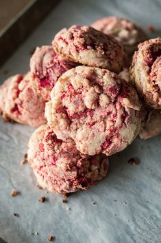 a pile of cookies sitting on top of a piece of paper