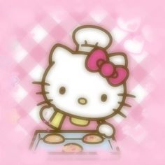 an image of a hello kitty with donuts in front of her on a pink background