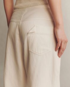 Deborah Kent's Boutique in South Tampa — Jetties Beach Pant in White Japanese Denim by TWP at Deborah Kent's Tapered Summer Bottoms With Belt Loops, Beige Summer Bottoms With Hip Pockets, Summer Beige Bottoms With Hip Pockets, Summer Wide Leg Jeans With Welt Pockets, Summer Wide-leg Jeans With Side Pockets, Summer Tapered Bottoms With Welt Pockets, Beige Bottoms With Patch Pockets For Spring, Beige Wide-leg Pants With Patch Pockets, Summer Bottoms With Hip Pockets And Straight Leg