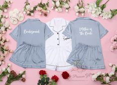 This personalized bridesmaid pajama set is crafted from high-quality satin fabric that feels as delicate and soft as silk. It ensures a skin-friendly experience without irritation or itching, making it perfect for everyday wear. The design pays close attention to detail, featuring a short-sleeve button-down top and drawstring-free shorts, providing both comfort and style for adults. This set makes an ideal gift for a variety of occasions, including bridal showers, bachelorette parties, birthdays Fitted Satin Set For Wedding Night, White Satin Sets For Wedding Night, Blue Short Sleeve Sets For Wedding, White Sets For Bridesmaid Gift, Blue Bridesmaid Pajamas, White Bridesmaid Gift Sets, Light Blue Bridesmaid Pajamas, Wedding Pyjamas Brides, White Satin Pajama Party Sets