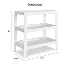 a white shelf with three shelves and measurements