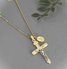 ♦  1.5" Gold Scroll Crucifix, made in Italy ♦  Gold plate Crucifix ♦  Gold plate chain w/ clasp ♦  Select 16 or 18" chain ♦  Optional: add a Miraculous Medal ♦  Comes in a gift box FLAT RATE SHIP add another item at NO additional cost Find other great items at  https://www.etsy.com/shop/MyLadyTreasures Gold Metal Cross Charm Necklaces, Gift Jewelry Chain With Crucifix Shape, Gold Metal Cross Necklace With Adjustable Chain, Gold Cross Necklace With Adjustable Chain As Gift, Gold Metal Crucifix Cross Necklace, Gold Cross Pendant Charm Necklace With Adjustable Chain, Gold Metal Cross Pendant Necklace, Nickel-free Gold Crucifix Jewelry, Metal Crucifix Necklace As Gift