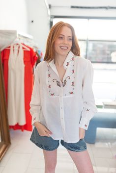 The CORDOBA shirt is a refined piece that marries the timeless simplicity of a white shirt with floral delicacy, creating an elegant, feminine look. Floral embroidery embellishes the shirt, creating a retro-chic look. About the fit: Merrik is wearing size small Merrik is 5’9” | 32a | Size 2-4 Pant Timeless Simplicity, Elegant Feminine, Shoe Gifts, Feminine Look, Retro Chic, The Shirt, Gift Accessories, Embroidered Shirt, Top Dress