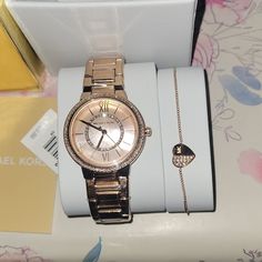 Sku: Mk1032 Case Size: 33mm Movement: Three Hand Platform: Gabbi Strap Material: Stainless Steel Strap Color: Rose Gold Case Water Resistance: 5 Atm Case Material: Stainless Steel Case Color: Rose Gold Dial Color: Rose Gold Strap Width: 18mm Closure: Bracelet Deployant Strap Inner Circumference: 175+/- 5mm Battery Type: Sr621sw Additional Product Details: Bracelet: Closure: Slider Primary Color: Rose Gold Material: Stainless Steel Measurements: 8.5in Long (Charm: 10mm X 9.4mm) Michael Kors Round Dial Watch As A Gift, Michael Kors Elegant Formal Watches, Michael Kors Jewelry With Round Dial For Gifts, Michael Kors Jewelry Gift With Round Dial, Michael Kors Jewelry Gift, Michael Kors Rose Gold Jewelry For Formal Occasions, Elegant Michael Kors Diamond Watch With Round Dial, Timeless Round Michael Kors Jewelry, Michael Kors Timeless Round Jewelry