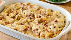 a casserole dish with meat and cheese in it