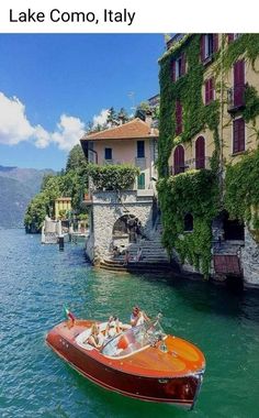 a small boat floating on top of a body of water