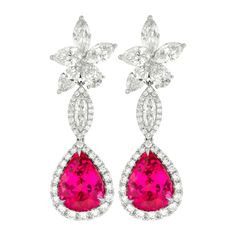 18kt white gold cluster pink tourmaline and diamonds earrings, features 12.70 (6.02+6.68ct) of two pink tourmalines and 10.15ct of 6 mq & rd diamonds. Luxury Pink Earrings With Brilliant Cut, Luxury Pink Sapphire Earrings For Formal Occasions, Pink Diamond Accent Earrings For Formal Occasions, Formal Pink Earrings With Diamond Accents, Luxury Pink Sapphire Earrings, Wedding Pink Sapphire Earrings, Fine Jewelry Earrings, Hot Pink Earrings, Diamonds Earrings