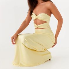 Brand New. Peppermayo Tianna Strapless Maxi Dress- Yellow. Looks Just Like The Model Photo, Some Photos I Took Had Weird Lighting. Features A Strapless Neckline And A Double Twist Bust Detail That Adds A Touch Of Elegance. - Maxi Length - Fully Lined - Centre Back Invisible Zipper At Skirt - Centre Back Zipper At Upper Back - Open Back - Strapless Neckline - Double Twist Bust Detail - Front Cut Out At Under Bust And Waist - Satin Material - Bias Cut Weird Lighting, Peppermayo Dress, Grown Dress, Double Twist, Yellow Maxi Dress, Yellow Maxi, Strapless Neckline, Strapless Maxi, Strapless Maxi Dress