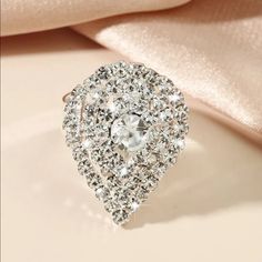 This Beauty Is Sure To Make A Statement With Its Sparkling Rhinestone And Center Large Rhinestone And It’s Adjustable. Elegant Bling Crystal Ring For Party, Elegant Party Crystal Ring With Bling, Elegant Crystal Ring With Bling For Party, White Sparkling Crystal Ring For Party, Elegant Rhinestone Crystal Ring, Diamond White Wedding Rings With Rhinestones, Elegant Formal Crystal Ring With Rhinestones, Wedding Rings In Diamond White With Rhinestones, Elegant Bling Crystal Ring