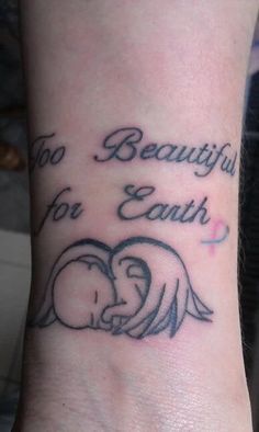 a woman's foot with a tattoo on it that says, no beautiful for earth