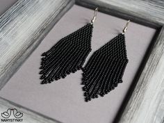 These minimalist black beaded earrings are made of high-quality Czech beads and strong synthetic thread. They are elegant, fashionable, and highly versatile, suitable for everyday wear.Features: Sterling silver componentsColor: Black.This item is currently in stock.You must be completely satisfied. If you find merchandise unsatisfactory for any reason, return it within 10 days and your money will be refunded without questions.More beaded earrings http://etsy.me/2ycItdb Gerdan necklaces http://et Beaded Earrings Black, Black Beaded Earrings, Yin En Yang, Native Earrings, Silver Bead Earrings, Turquoise Bead Earrings, Blue Beaded Earrings, Ombre Earrings, Beaded Earrings Native