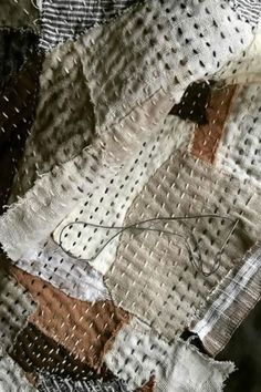 an old piece of cloth with holes in it