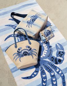 Our Straw Beach Tote is the perfect beach, market, or pool tote! This roomy bag is a must have, with the faux straw and linen interior. Embroidered icon on faux straw Lobster closure Interior zipper pocket and 2 slip pockets Dimensions: 19'' W; 12.5'' H; 6'' D Crab Embroidery, Rope Bags, Beach Market, Summer Accessories Beach, Straw Beach Tote, 90s Accessories, Nora Fleming Minis, Linen Interior, Spartina 449