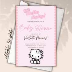 a hello kitty baby shower is shown in pink