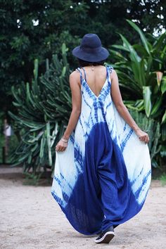 "Sleeveless Backless Tie Dye Jumpsuit for Summer Beautiful and breathable 100% double gauze cotton fabric, hand tie-dyed with indigo eco dye Shibori technic. Sizing: Made in one size to fit M to XXL / US: 6/8/10/12/14/16/18 Measurement; Chest up to 48\" Hip max 49\" Length does not include the strap outseam 33\" Length from top to the longest part (middle) 56\" Leg hem circumference 80\" **Model is a size US 6, 33\" bust, 35\" hip, 165 cm Tall. ** Very flattering flowy jumpsuit with lots of flow Blue Sleeveless Jumpsuits And Rompers For Summer, Blue Sleeveless Jumpsuit For Summer, Cotton Beachwear Jumpsuits And Rompers For Beach Season, Cotton Jumpsuits And Rompers For Beach Vacation, Sleeveless Summer Jumpsuits And Rompers For Festival, Cotton Jumpsuits And Rompers For Summer Festivals, Summer Sleeveless Cotton Jumpsuits And Rompers, Cotton Beachwear Jumpsuits And Rompers For Summer, Summer Beachwear Cotton Jumpsuits And Rompers