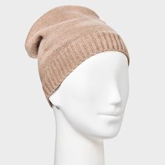 Get the look and feel of cashmere with the Cashfeel Cuffless Beanie from A New Day™. This solid-color beanie is knit from recycled polyester fabric with added spandex for softness and stretch. With no cuff and a ribbed hem, this versatile hat is great for both casual and dressier days. A New Day™: Style that goes wherever you do. Comfortable Fall Beanie In Solid Color, Fitted Warm Beanie, Comfortable Soft Knit Beanie In One Size, Cozy Soft Beanie One Size, Comfortable Soft Knit Beanie One Size, Casual Fitted Beanie Bonnet, Warm Beige One-size Beanie, Cozy One Size Soft Beanie, Comfortable One-size Soft Knit Beanie