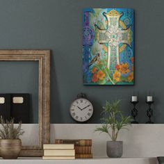 a painting on the wall above a mantle with books and plants in front of it