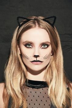 Recreate a cat look this Halloween. Find the accessories and beauty finds you need to complete the look.  #Halloween Women’s Cat Costume Diy, Diy Adult Cat Costume For Women, Diy Cat Face Makeup Easy, Last Minute Cat Costume, Cat Costume Diy Women's, Cat Makeup Costume, Calico Cat Makeup, Womens Cat Costume Halloween, Cat Halloween Costume Makeup