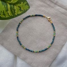 Handmade turquoise toho and miyuki picasso beads anklet with miyuki gold seed beads and 24kt coated gold findings. 🌺 Handmade with stainless steel beading wire. Length: About ~25cm. (~9.5 inches) 🌸 Please feel free to ask me any suggestion! :) *Price will likely vary for customizations and different lengths. 🌻 Care instructions: In order for your jewellery to stay in perfect condition, avoid contact with any harsh chemicals, creams, perfumes and water. Remove before showering, swimming or exercise. It is best to store your jewellery in a dark dry place avoiding direct sunlight, such as a jewellery box when not worn. I am not responsible for breakages on your own behalf. 🌳 Packaging is 100% biodegradable. Every order comes with a little treat :) #seedbeadanklet #jewelry #anklet #seedbea Y2k Gifts, Adjustable Turquoise Anklet With Tiny Beads, Beads Anklet, Turquoise Multi-strand Tiny Beads, 90s Retro, Chain Extenders, Beaded Anklets, Beading Wire, Yellow Gold Chain