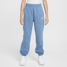 Meet our favorite cozy essential. Made from lightweight fleece that's smooth on the outside and brushed soft on the inside, these sweats are an easy layer when you want a little extra warmth. A loose fit through the legs helps make them feel extra comfy. Blue Fleece Joggers For Loungewear, Nike Sweatpants With Elastic Waistband For Spring, Casual Solid Soft Sweatpants, Casual Soft Solid Color Sweatpants, Casual Soft Solid Sweatpants, Nike Comfortable Sweatpants With Elastic Waistband, Nike Comfortable Sweats With Elastic Waistband, Comfortable Nike Sweats With Elastic Waistband, Blue Fleece Activewear For Loungewear