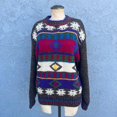 Vintage 90's Geometric abstract priny sweater. The perfect fall winter sweater. Mock Turtleneck. Nice rainbow colors. Dry clean. Size -Marked a small but great on many mediums. Oversized. Chest - 42 inches, Waist - 34 inches, Length - 26 inches.  Material - Acrylic, Wool, Viscose Brand - Magnet Condition - Great. No holes ,rips or stains. Gentle age in fabric. Cheers, Kerri Geometric Sweater, Sweater Oversize, Mock Turtleneck, Oversized Pullover, Printed Sweater, Winter Sweaters, Abstract Print, Women Pullover, Chunky Knit