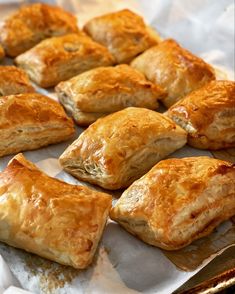 there are many pastries on the tray ready to be baked in the oven and eaten