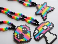 These kandi necklaces are made with rainbow, black pony beads, neon perler beads.  These kandi necklaces glow under blacklight! One size fits all  This Item is premade and is ready to ship! Perfect for any event! You will get lots of compliments in this unique wearable art! Stand out at your next event! Birthday party  Edm festival  Raves Rave outfit  Festival outfit Pride Glow party  Rave birthday  Rave gift  Rave anniversary  Stocking stuffer Handmade Multicolor Rave Necklaces, Rave Birthday, Rave Necklace, Festival Survival Kit, Rave Kandi Ideas, Rave Candy, Rainbow Kandi, Trippy Rainbow, Alien Necklace